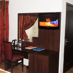 Отель Grand Inn & Suites удобства в номере
