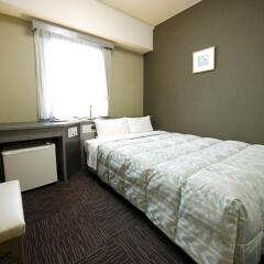 Отель Route Inn Toyama Ekimae Тояма комната для гостей
