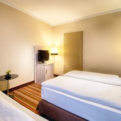 Leonardo Hotel & Residenz München комната для гостей фото 7