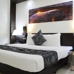 Отель Executive Plaza Hotel Филиппины, Манила - отзывы, цены и фото номеров - забронировать отель Executive Plaza Hotel онлайн комната для гостей фото 2
