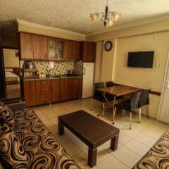 Kizkalesi Sari Konak Apart Otel Турция, Силифке - отзывы, цены и фото номеров - забронировать отель Kizkalesi Sari Konak Apart Otel онлайн комната для гостей