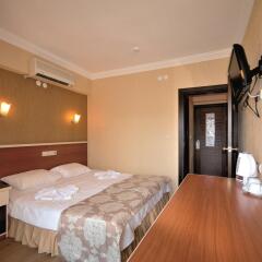 Epic Hotel & Apartments комната для гостей