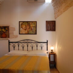 Отель Trulli Holiday Albergo Diffuso Альберобелло комната для гостей