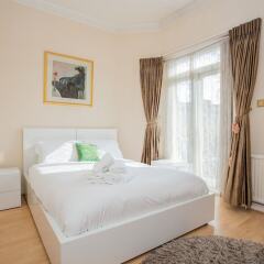 Апартаменты Lovely 2 Bedroom Apartment Near Hyde Park Лондон комната для гостей фото 5