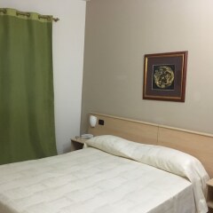 Hotel Ginepro Куальяно сейф в номере