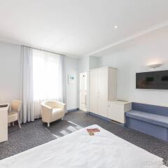Отель Novum Hotel Post Aschaffenburg Германия, Ашаффенбург - отзывы, цены и фото номеров - забронировать отель Novum Hotel Post Aschaffenburg онлайн комната для гостей