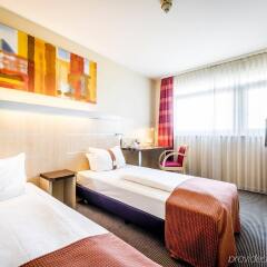 Отель Holiday Inn Express Cologne Mulheim Кёльн комната для гостей фото 3