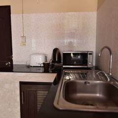 Апартаменты Baan Chai Lay Apartment Ланта в номере