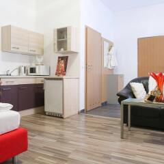 Апартаменты Queens Apartments комната для гостей фото 2