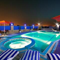 Отель Rolla Residence Hotel Apartment ОАЭ, Дубай - отзывы, цены и фото номеров - забронировать отель Rolla Residence Hotel Apartment онлайн бассейн фото 3