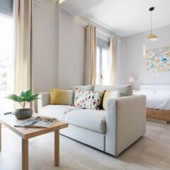 Апартаменты Omnia Pagrati Apartments комната для гостей фото 4