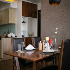Апартаменты Poonsa Serviced Apartment питание