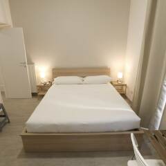 Апартаменты Santi Quattro Apartment & Rooms - Colosseo комната для гостей фото 4