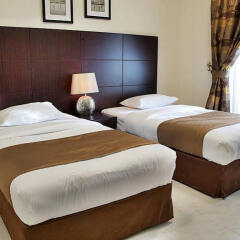 Отель Tulip Inn Hotel Apartments ОАЭ, Аджман - отзывы, цены и фото номеров - забронировать отель Tulip Inn Hotel Apartments онлайн комната для гостей