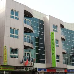 Al Manar Hotel Apartments вид на фасад фото 2