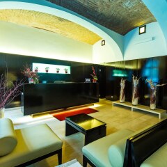Апартаменты The Levante Laudon Apartments гостиничный бар