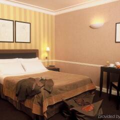 Hotel Victoires Opera комната для гостей