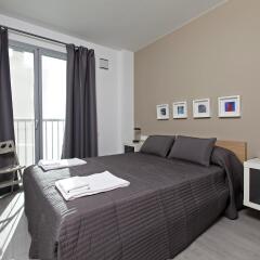 Апартаменты Bbarcelona Apartments Gaudi Flats Барселона комната для гостей