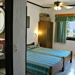 Апартаменты Iliostasi Beach Apartments комната для гостей фото 5