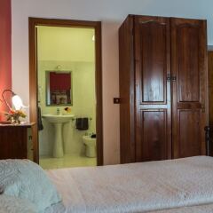 Отель Agriturismo Il Giglio Ористано сейф в номере