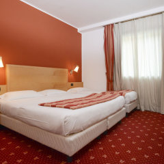 Отель SHG Grand Hotel Milano Malpensa Италия, Сомма-Ломбардо - 1 отзыв об отеле, цены и фото номеров - забронировать отель SHG Grand Hotel Milano Malpensa онлайн комната для гостей фото 2