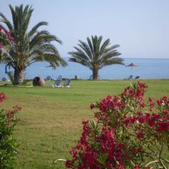 Natura Beach Hotel and Villas пляж фото 2