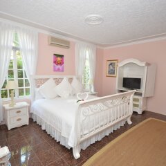 Отель Summerhill, 8BR by Jamaican Treasures Ямайка, Монтего-Бей - отзывы, цены и фото номеров - забронировать отель Summerhill, 8BR by Jamaican Treasures онлайн комната для гостей фото 4