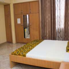Отель Jayliz Lodge-Tema Тема удобства в номере