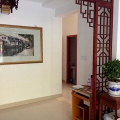 Отель Zhouzhuang Wangjiangting Hostel Китай, Сучжоу - отзывы, цены и фото номеров - забронировать отель Zhouzhuang Wangjiangting Hostel онлайн интерьер отеля