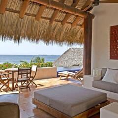 Отель Las Palmas Beachfront Villas Мексика, Коакоюл - отзывы, цены и фото номеров - забронировать отель Las Palmas Beachfront Villas онлайн комната для гостей