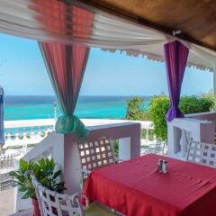 Отель Starfish Beach Studio At Montego Bay Club Resort Ямайка, Монтего-Бей - отзывы, цены и фото номеров - забронировать отель Starfish Beach Studio At Montego Bay Club Resort онлайн балкон