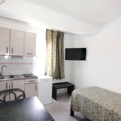 Отель Apartamentos Central City в номере