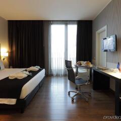 Отель Holiday Inn Genoa City комната для гостей