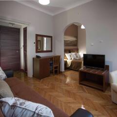 Отель Ambrosia Suites & Aparts комната для гостей