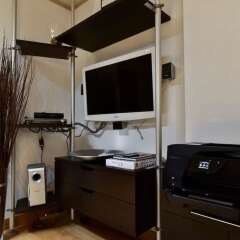 Отель Home Sorbara сейф в номере