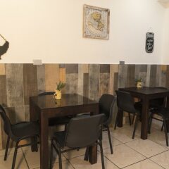 Отель Micro Hotel Rio de Piedras Гондурас, Сан-Педро-Сула - отзывы, цены и фото номеров - забронировать отель Micro Hotel Rio de Piedras онлайн питание