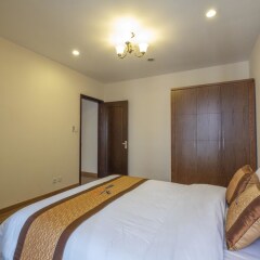 Апартаменты Bayhomes Times City Serviced Apartment комната для гостей фото 3