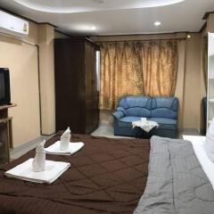 Апартаменты President Apartment Паттайя комната для гостей фото 4
