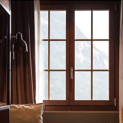 Отель HUUS Gstaad Швейцария, Занен - отзывы, цены и фото номеров - забронировать отель HUUS Gstaad онлайн удобства в номере
