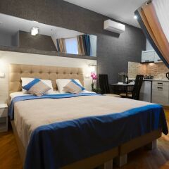 Antares Apart Hotel Львов комната для гостей фото 2