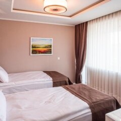 Отель Arpezos Болгария, Карджали - отзывы, цены и фото номеров - забронировать отель Arpezos онлайн комната для гостей фото 4