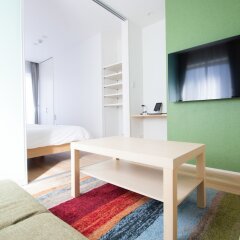 Apartment Hotel Tenjin Tumugu Фукуока комната для гостей фото 5