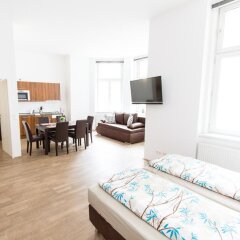 Апартаменты Leonhard Apartments Vienna Вена комната для гостей
