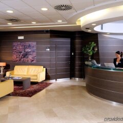Отель Aemilia Hotel Bologna Италия, Болонья - 1 отзыв об отеле, цены и фото номеров - забронировать отель Aemilia Hotel Bologna онлайн интерьер отеля фото 3