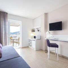 Отель Aparthotel Tropic Garden Испания, Санта-Эулалия-дель-Рио - отзывы, цены и фото номеров - забронировать отель Aparthotel Tropic Garden онлайн комната для гостей фото 5