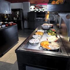 Отель Grand Times Hotel Quebec City Airport Канада, Л'Ансьен-Лорет - отзывы, цены и фото номеров - забронировать отель Grand Times Hotel Quebec City Airport онлайн питание фото 2