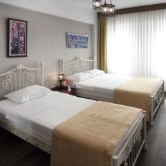 Отель Rüzgargülü Otel Бозджаада комната для гостей фото 5