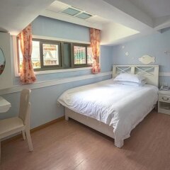 Отель Xiamen Gulangyu Sunshine Dora's House Китай, Сямынь - отзывы, цены и фото номеров - забронировать отель Xiamen Gulangyu Sunshine Dora's House онлайн комната для гостей фото 5
