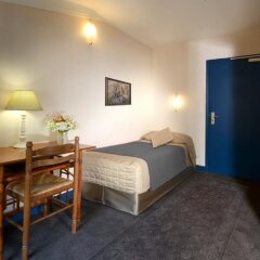 Отель Hôtel Exelmans удобства в номере
