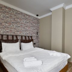 Апартаменты Gudauri Loft Грузия, Гудаури - 1 отзыв об отеле, цены и фото номеров - забронировать отель Gudauri Loft онлайн комната для гостей фото 2